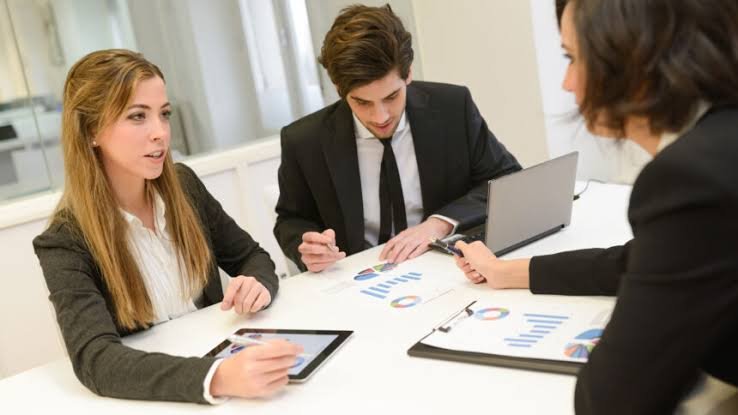 A consultation meeting reviewing study plans