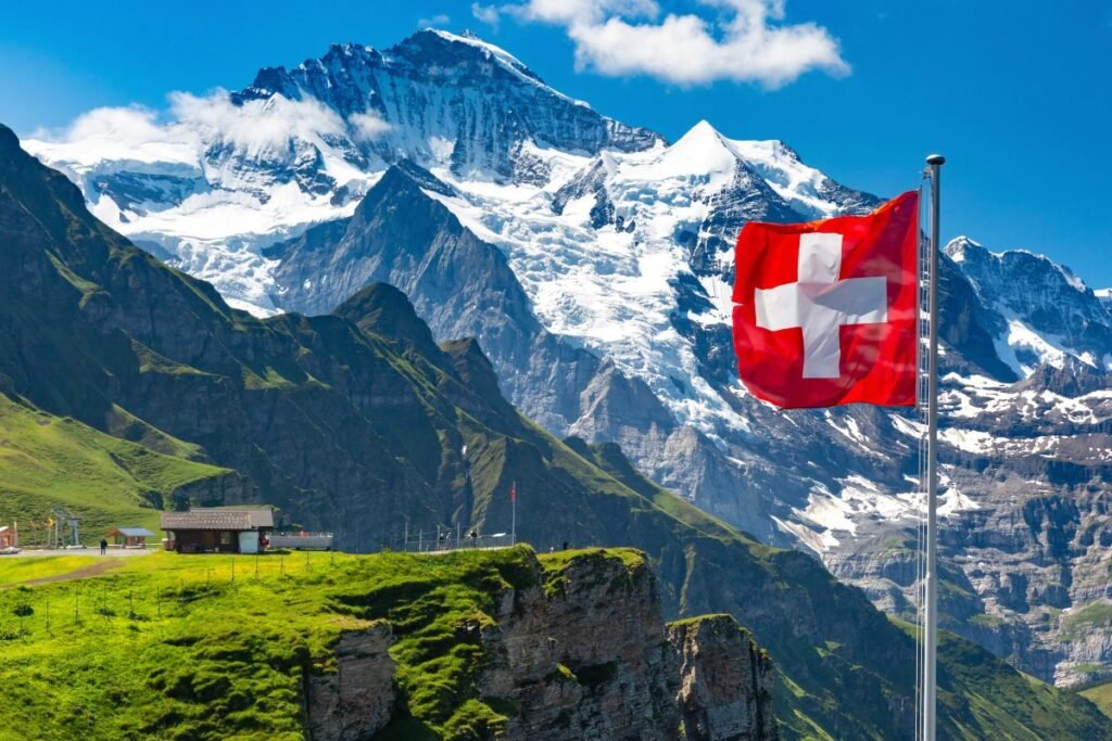 Swiss Alps with the Swiss flag